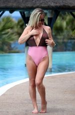 DANIELLE MASON in Swimsuits at a Pool in Spain 05/01/2018