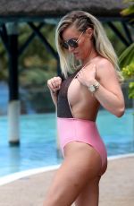 DANIELLE MASON in Swimsuits at a Pool in Spain 05/01/2018