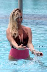DANIELLE MASON in Swimsuits at a Pool in Spain 05/01/2018