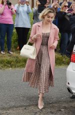 EMILIA CLARKE Arrives at Kit Harington and Rose Leslie