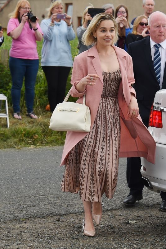 EMILIA CLARKE Arrives at Kit Harington and Rose Leslie’s Wedding in Aberdeen 06/23/2018
