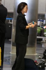 EVANGELINE LILLY at LAX Airport in Los Angeles 06/22/2018