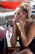 FERNE MCCANN in Bikini at Pool Club in Marbella 06/22/2018