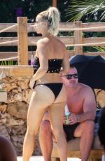 FERNE MCCANN in Bikini at Pool Club in Marbella 06/22/2018