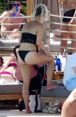FERNE MCCANN in Bikini at Pool Club in Marbella 06/22/2018