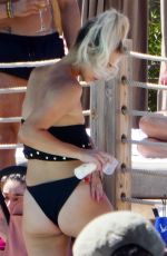 FERNE MCCANN in Bikini at Pool Club in Marbella 06/22/2018