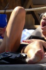 FERNE MCCANN in Bikini at Pool Club in Marbella 06/22/2018
