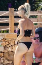 FERNE MCCANN in Bikini at Pool Club in Marbella 06/22/2018