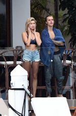 HAILEY BALDWIN and Justin Bieber on His Mansion Balcony in Miami 06/11/2018