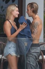 HAILEY BALDWIN and Justin Bieber on His Mansion Balcony in Miami 06/11/2018