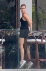HAILEY BALDWIN and Justin Bieber on His Mansion Balcony in Miami 06/11/2018