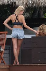 HAILEY BALDWIN and Justin Bieber on His Mansion Balcony in Miami 06/11/2018