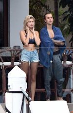 HAILEY BALDWIN and Justin Bieber on His Mansion Balcony in Miami 06/11/2018