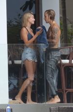 HAILEY BALDWIN and Justin Bieber on His Mansion Balcony in Miami 06/11/2018