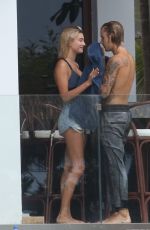 HAILEY BALDWIN and Justin Bieber on His Mansion Balcony in Miami 06/11/2018