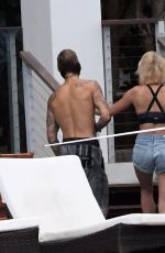 HAILEY BALDWIN and Justin Bieber on His Mansion Balcony in Miami 06/11/2018