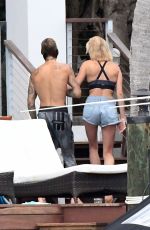 HAILEY BALDWIN and Justin Bieber on His Mansion Balcony in Miami 06/11/2018