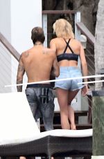 HAILEY BALDWIN and Justin Bieber on His Mansion Balcony in Miami 06/11/2018