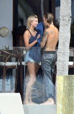 HAILEY BALDWIN and Justin Bieber on His Mansion Balcony in Miami 06/11/2018
