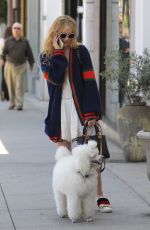 KATHRYN NEWTON Out with Her Dog on Rodeo Drive in Beverly Hills 06/20/2018