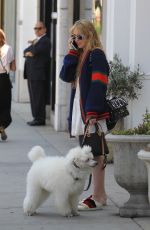 KATHRYN NEWTON Out with Her Dog on Rodeo Drive in Beverly Hills 06/20/2018