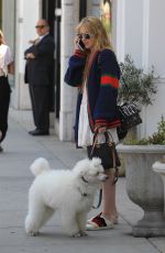 KATHRYN NEWTON Out with Her Dog on Rodeo Drive in Beverly Hills 06/20/2018