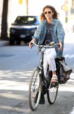 KERI RUSSELL Riding a Bike Out in New York 06/12/2018