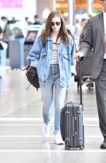 LILY COLLINS in Double Denim at LAX Airport in Los Angeles 06/04/2018