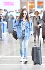 LILY COLLINS in Double Denim at LAX Airport in Los Angeles 06/04/2018