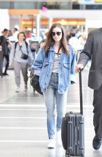 LILY COLLINS in Double Denim at LAX Airport in Los Angeles 06/04/2018