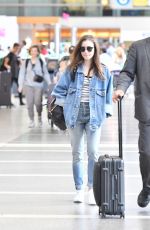 LILY COLLINS in Double Denim at LAX Airport in Los Angeles 06/04/2018