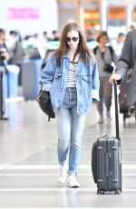 LILY COLLINS in Double Denim at LAX Airport in Los Angeles 06/04/2018