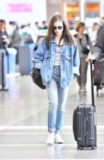 LILY COLLINS in Double Denim at LAX Airport in Los Angeles 06/04/2018