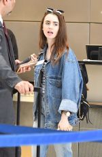 LILY COLLINS in Double Denim at LAX Airport in Los Angeles 06/04/2018