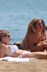 LOTTIE MOSS and TIN A STINNES in Bikinis at a Beach in Barcelona 06/13/2018