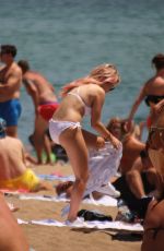 LOTTIE MOSS and TIN A STINNES in Bikinis at a Beach in Barcelona 06/13/2018