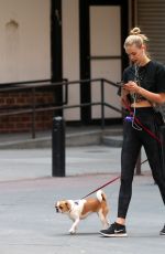 MEGAN WILLIAMS Out with Her Dog in New York 06/09/2018