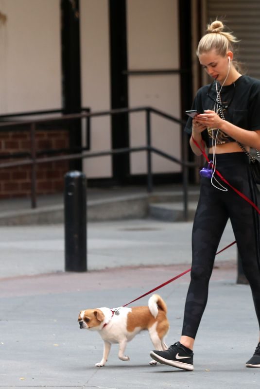 MEGAN WILLIAMS Out with Her Dog in New York 06/09/2018