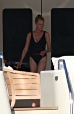 MELANIE GRIFFITH in Swimsuit at a Boat in Sardinia 06/20/2018