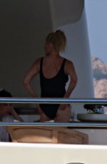 MELANIE GRIFFITH in Swimsuit at a Boat in Sardinia 06/20/2018