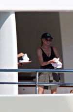MELANIE GRIFFITH in Swimsuit at a Boat in Sardinia 06/20/2018