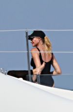 MELANIE GRIFFITH in Swimsuit at a Boat in Sardinia 06/20/2018