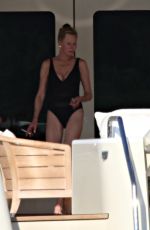 MELANIE GRIFFITH in Swimsuit at a Boat in Sardinia 06/20/2018