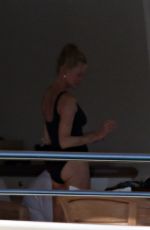 MELANIE GRIFFITH in Swimsuit at a Boat in Sardinia 06/20/2018