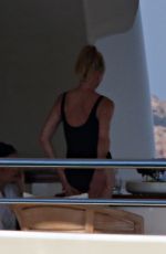 MELANIE GRIFFITH in Swimsuit at a Boat in Sardinia 06/20/2018