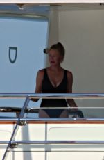 MELANIE GRIFFITH in Swimsuit at a Boat in Sardinia 06/20/2018
