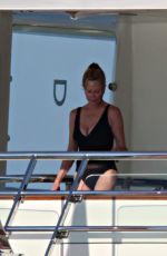 MELANIE GRIFFITH in Swimsuit at a Boat in Sardinia 06/20/2018