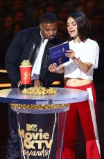 MILA KUNIS at 2018 MTV Movie and TV Awards in Santa Monica 06/16/2018