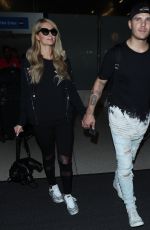 PARIS HILTON and Chris Zylka at LAX Airport in Los Angeles 06/18/2018