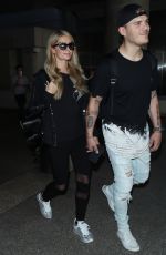 PARIS HILTON and Chris Zylka at LAX Airport in Los Angeles 06/18/2018